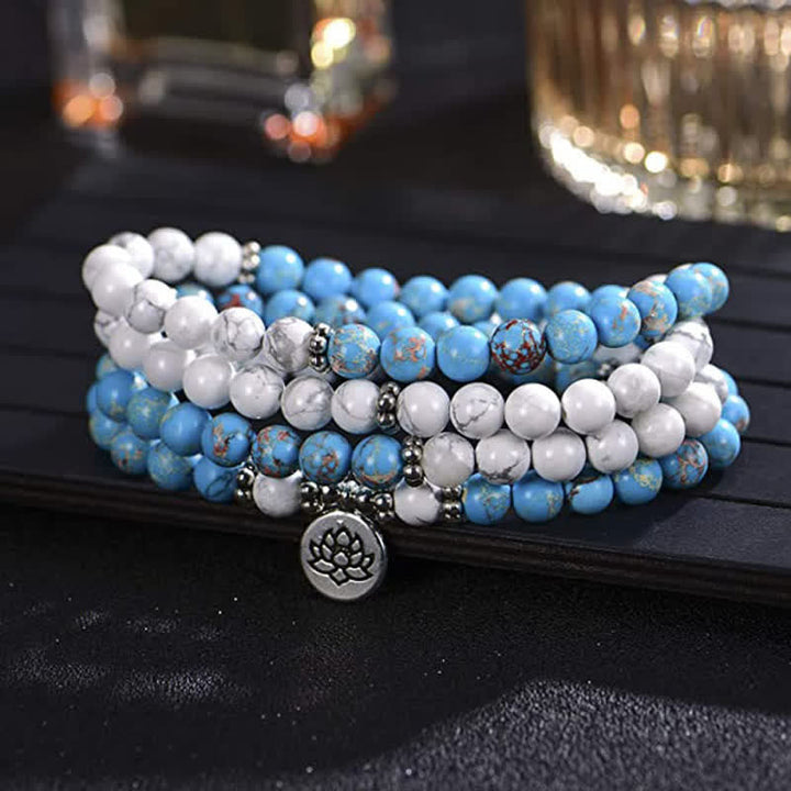 Armband Türkis Lotus – Segen mit weißen und blauen Perlen Lotus Anhänger