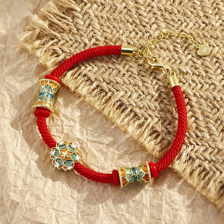 Rotes Armband 925 Silber Lotus mit goldfarbenen Verzierungen elegant.