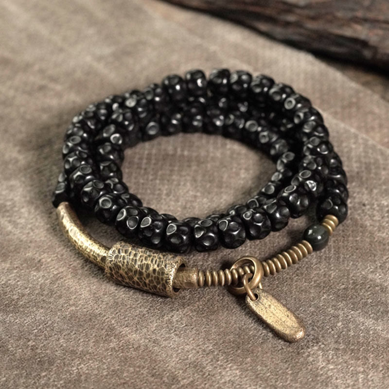 Schwarzes Kokosholz Armband Kupfer Retro Glück elastisch Naturstein