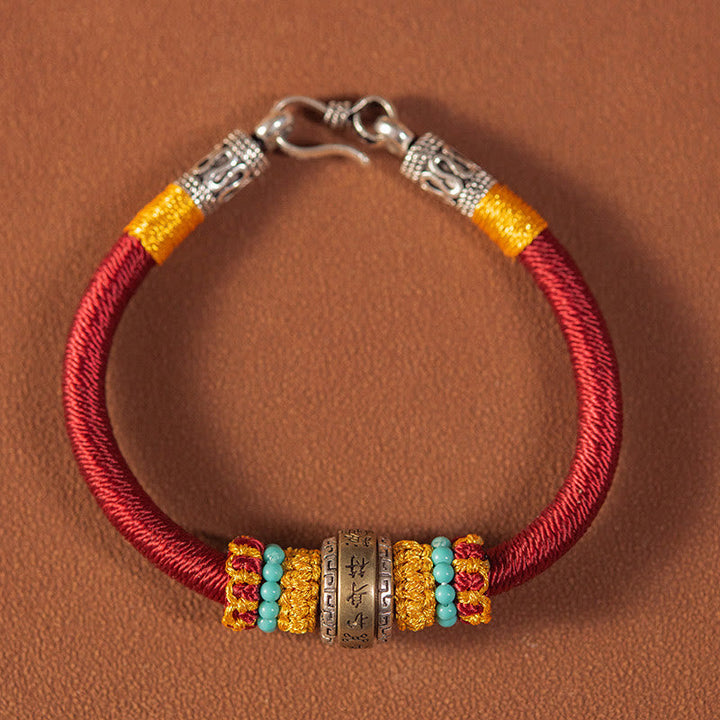 Armband – Schutz & Glück Stärke rotes Seidenband goldene Perlen Türkis