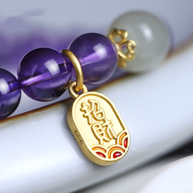 Armband Amethyst Kristall Heilung Harmonie lila Perlen Goldmedaillon elegant