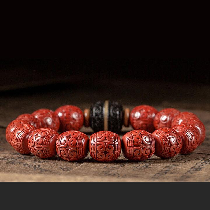 Rotes Zinnober Ebenholz Armband mit geschnitzten Mustern elegant.