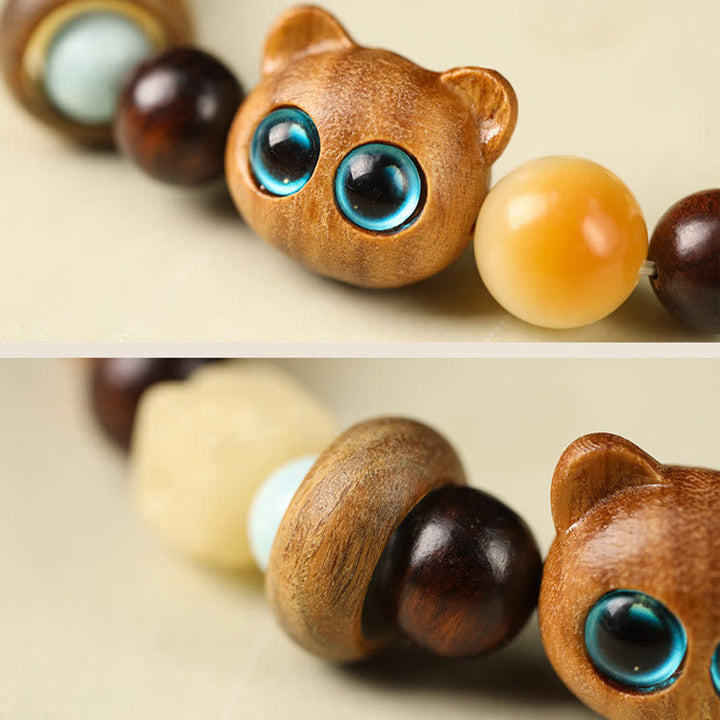 Sandelholz Bodhi Katze Armband mit blauen Augen Glück Frieden.