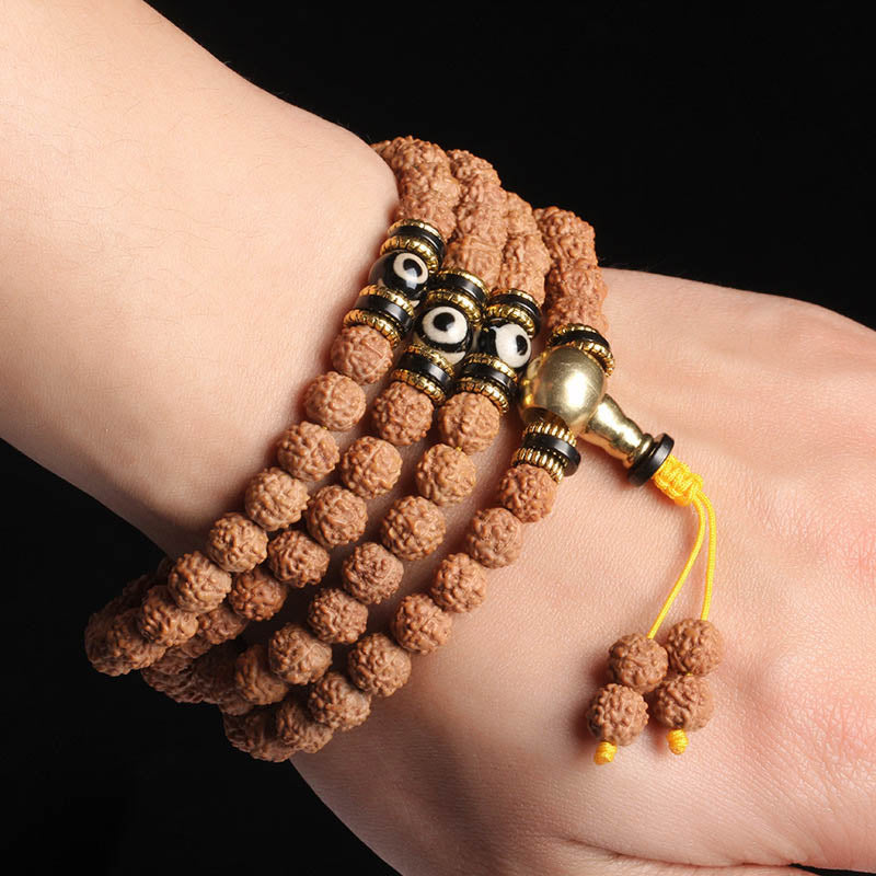 Mala Bodhi Armband Glück Wohlstand braune Rudraksha Perlen Goldakzente elegant