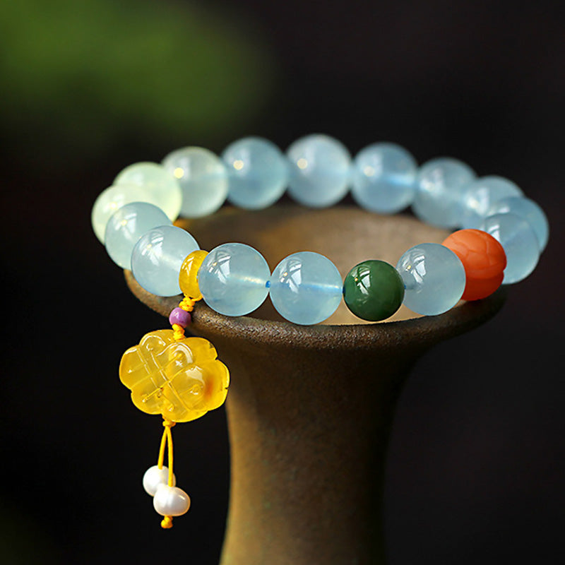 Armband Aquamarin – Frieden mit gelbem Anhänger elegantes Design.
