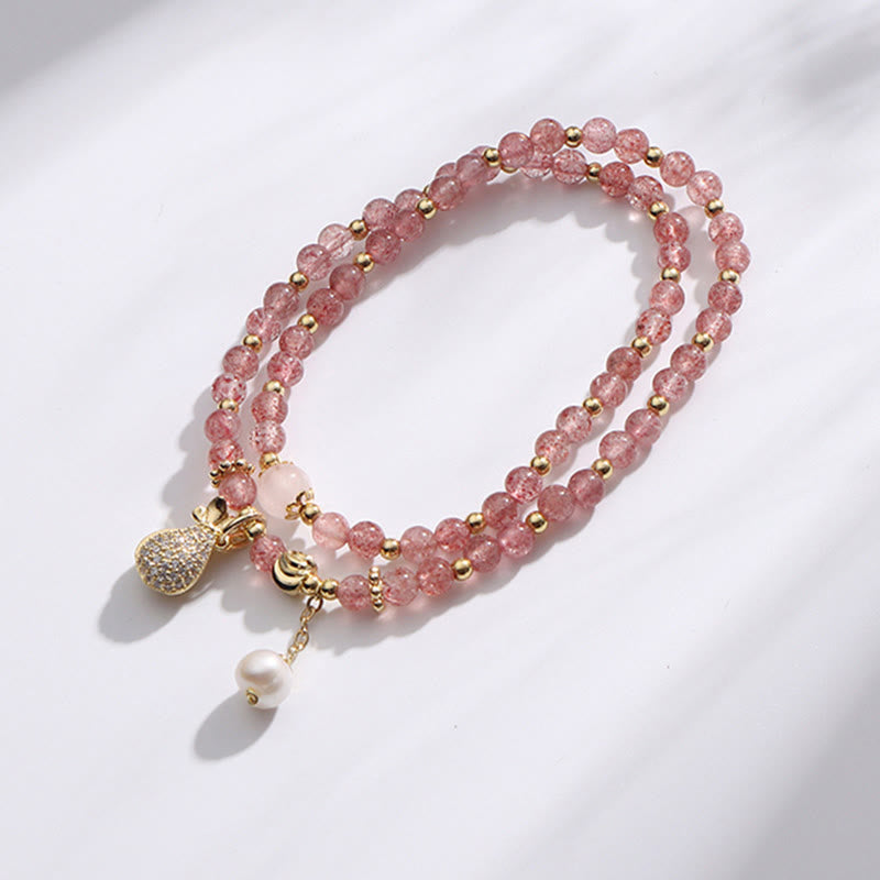 Armband Erdbeerquarz rosa Perlen Goldakzente Perlanhänger elegant