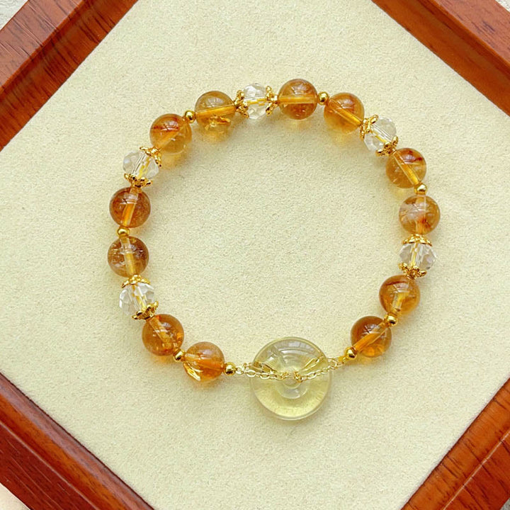 Armband Citrin Kristall Frieden Wohlstand goldene Perlen elegant.