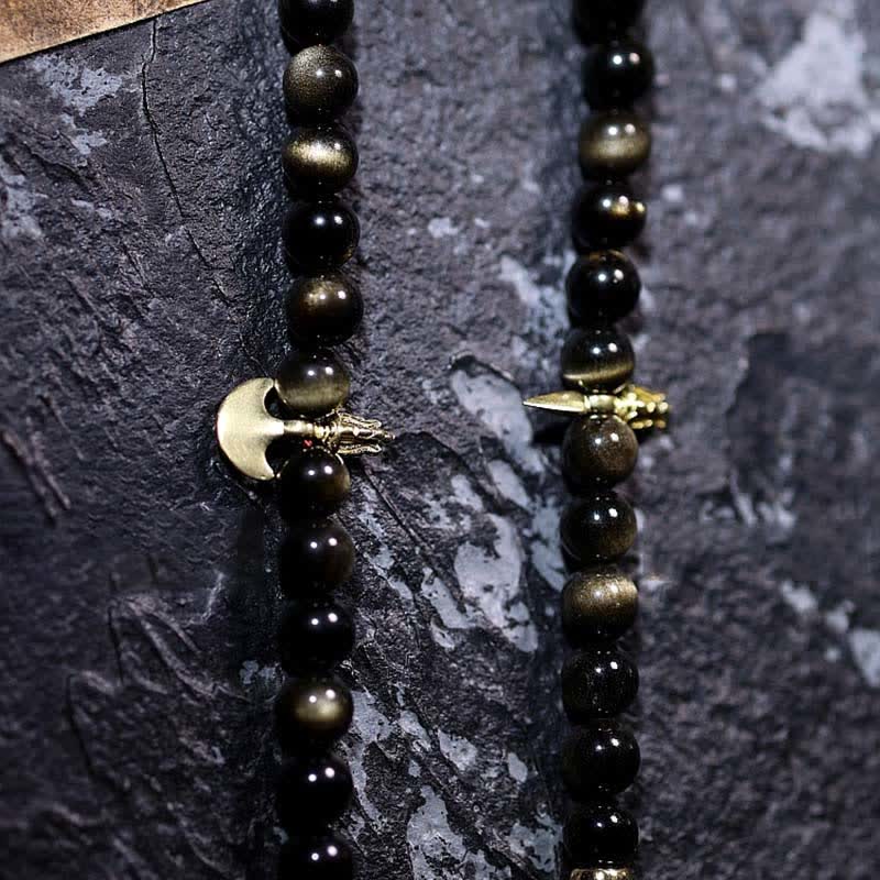 Mala Tigerauge Obsidian Armband mit Mond- und Sternenanhängern schwarz.