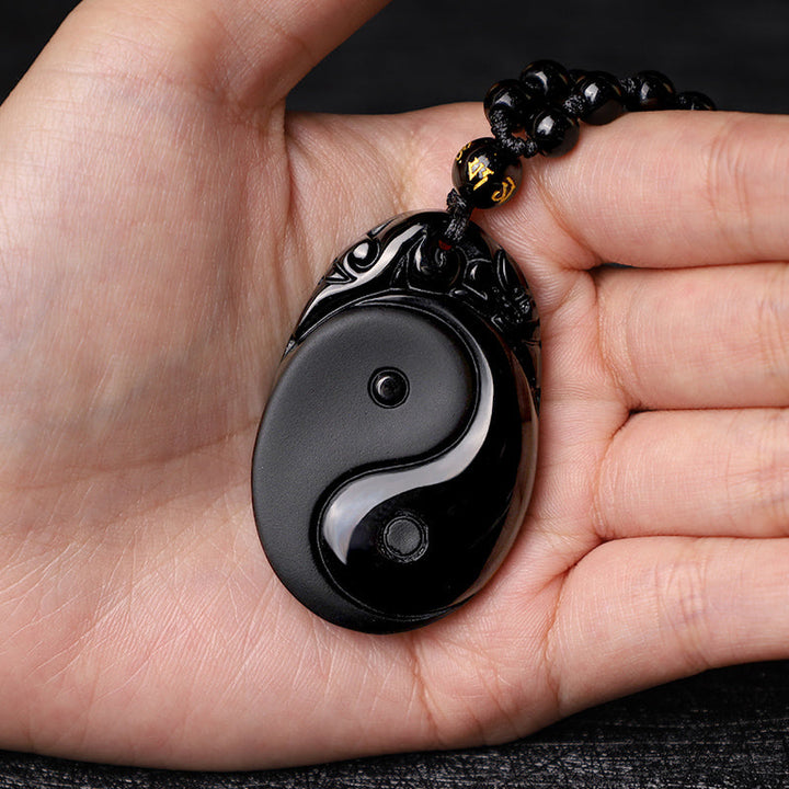 Anhänger Obsidian Yin Yang schwarzer Naturstein Kraft Erfüllung Perlen