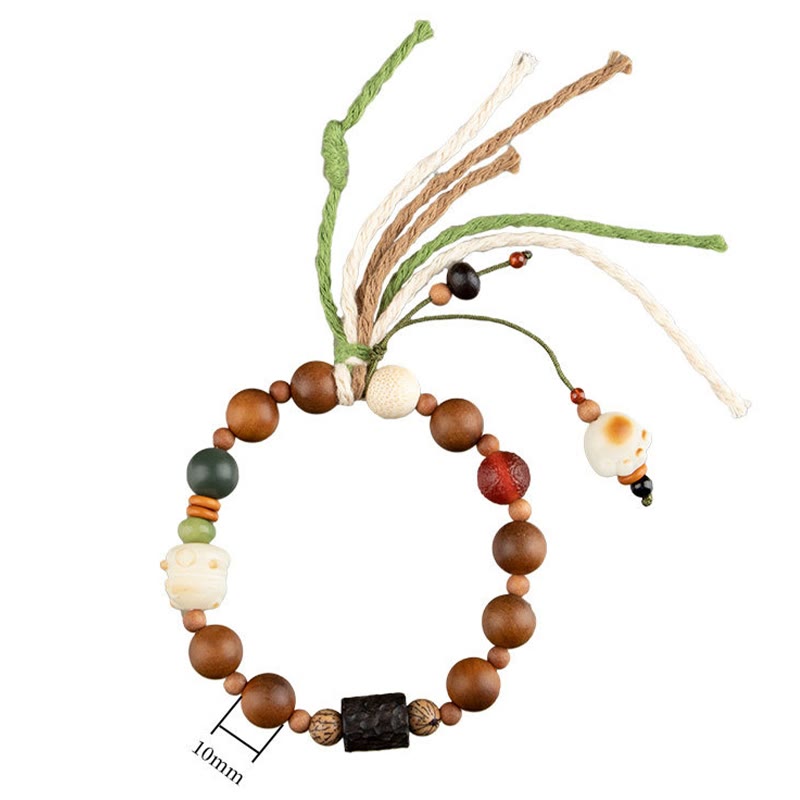 Bodhi Armband mit Holzperlen und Schutzsteinen elastisch getragen