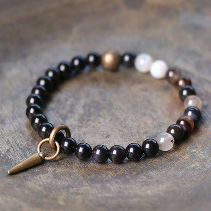 Schwarzer Obsidian Armband mit Natursteinen und Bronzespitze elegant.