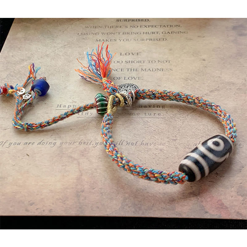 Bunte Makramee Armband mit Dzi Perle und Quasten Schmuck.
