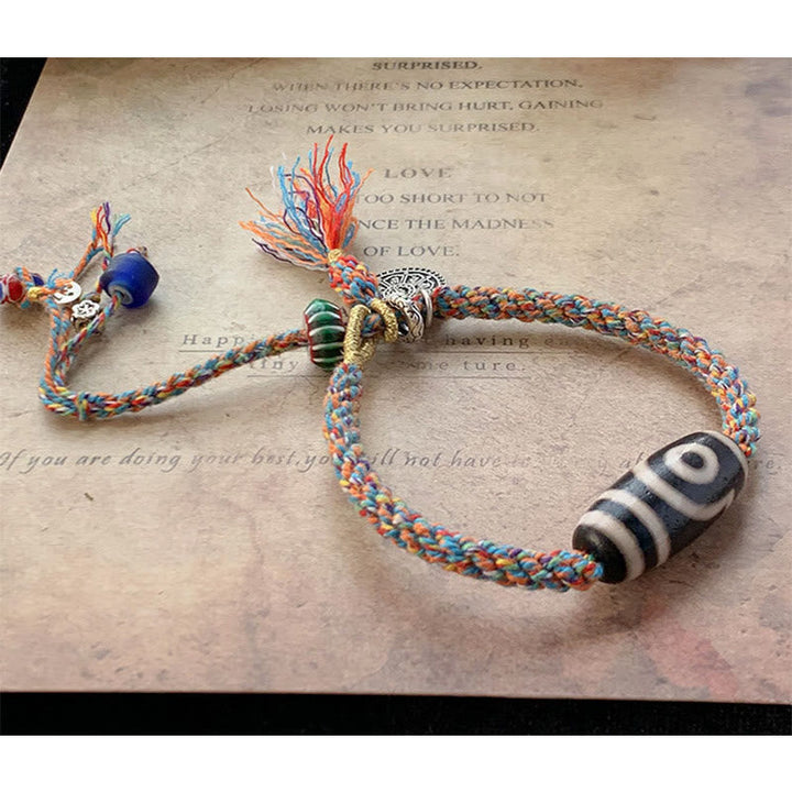 Bunte Makramee Armband mit Dzi Perle und Quasten Schmuck.