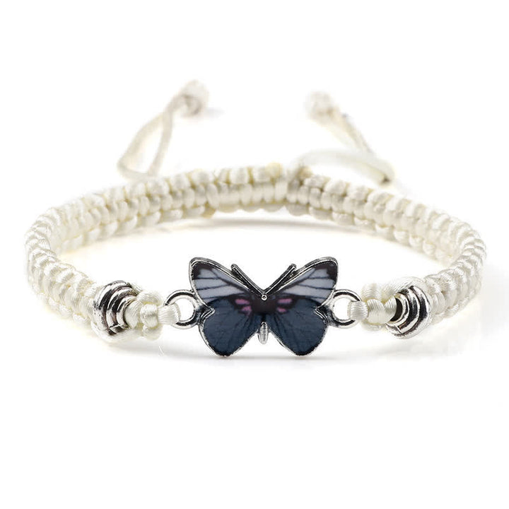 Armband Schmetterling – Liebe mit schwarzem Schmetterling Anhänger weiß geflochten
