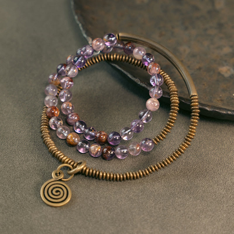 Armband Kupfer – Liebe mit Amethyst Perlen und Spiralanhänger bronze