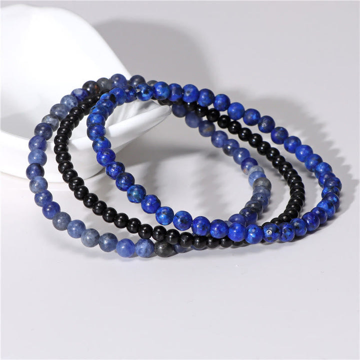 Armband Kristall – Frieden Lapislazuli Sodalith schwarze Perlen elastisch