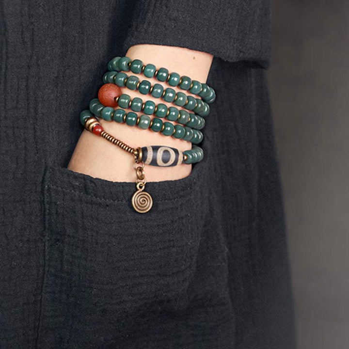 Mala 108 Perlen Bodhi – Energie Armband grüne Perlen Roter Achat Spirale