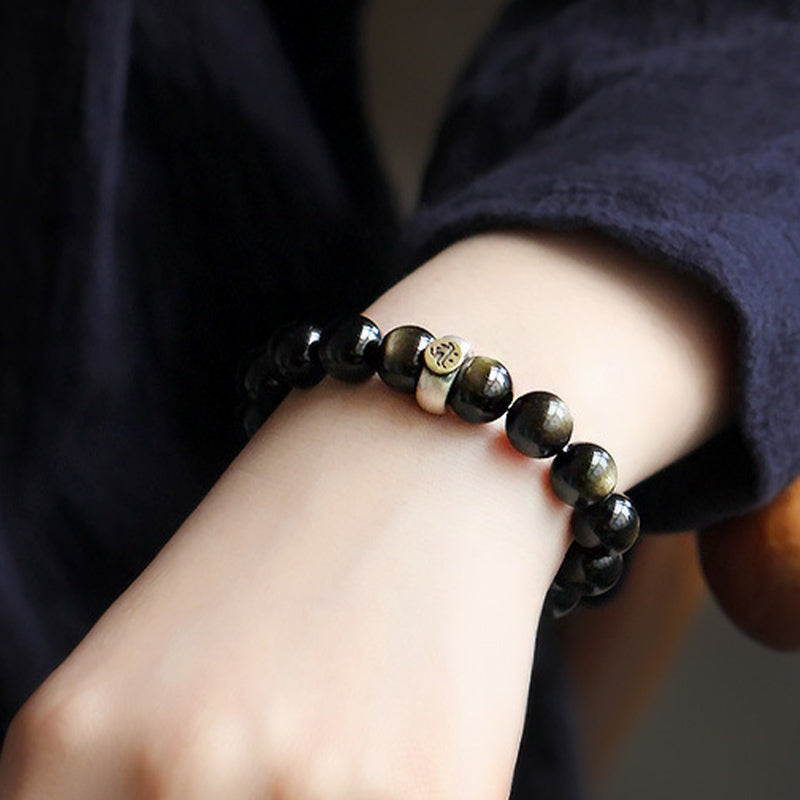 Armband Obsidian Chinesisches Tierkreis schwarze Perlen Handgelenk elegant getragen