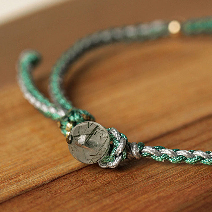 Grünes Armband mit weißer Jade Kugel Glück Frieden Naturstein elegant
