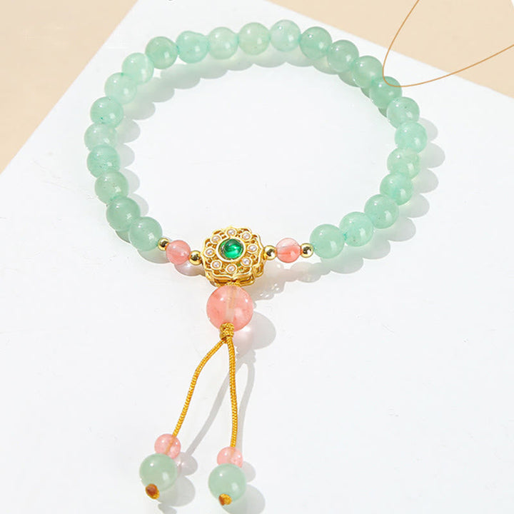 Armband Grüner Aventurin mit rosa Quarz und goldenen Elementen elegantes Design.