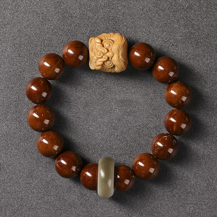 Armband Bodhi Samen Tanzendes Löwe Holzperlen Naturstein elegant