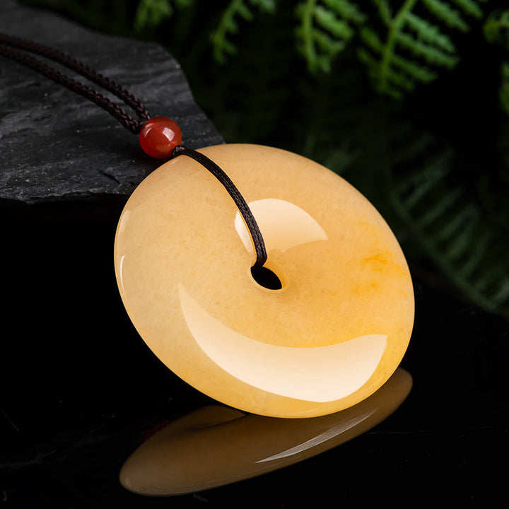Kette goldene Jade Anhänger Donut Naturstein