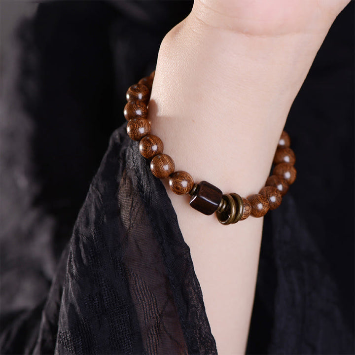 Armband Phoebe Zhennan Holz Spirituality braun Perlen Handgelenk elegant