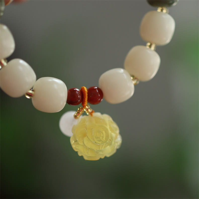 Armband Bodhi Lotus – Frieden Energie weiße Perlen gelbe Blüte Anhänger