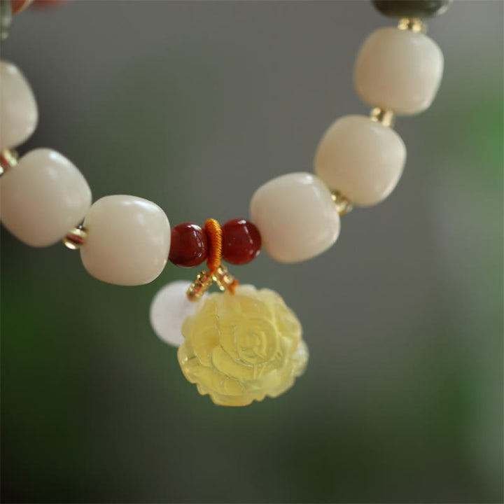 Armband Bodhi Lotus – Frieden Energie weiße Perlen gelbe Blüte Anhänger