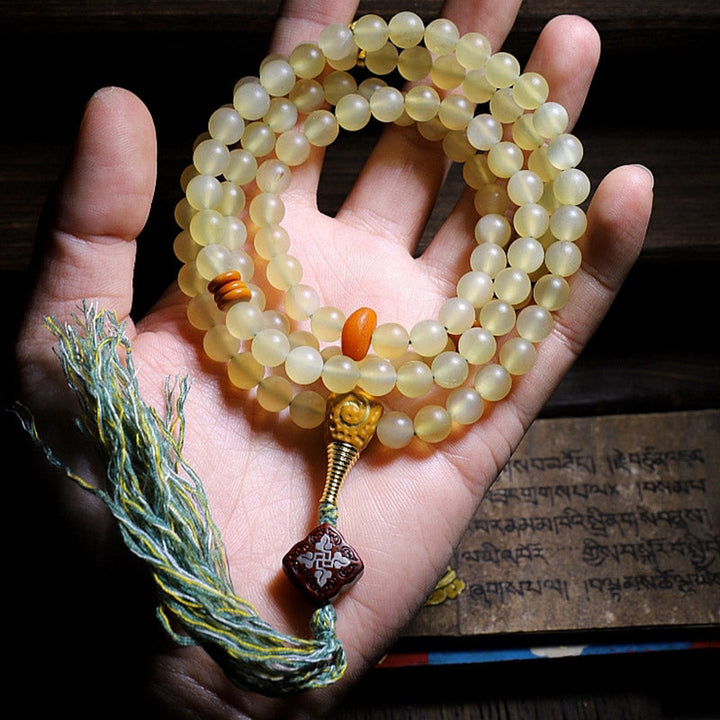 Mala Bernstein Glück Armband bernsteinfarbene Perlen goldene Verschlüsse Handgelenk