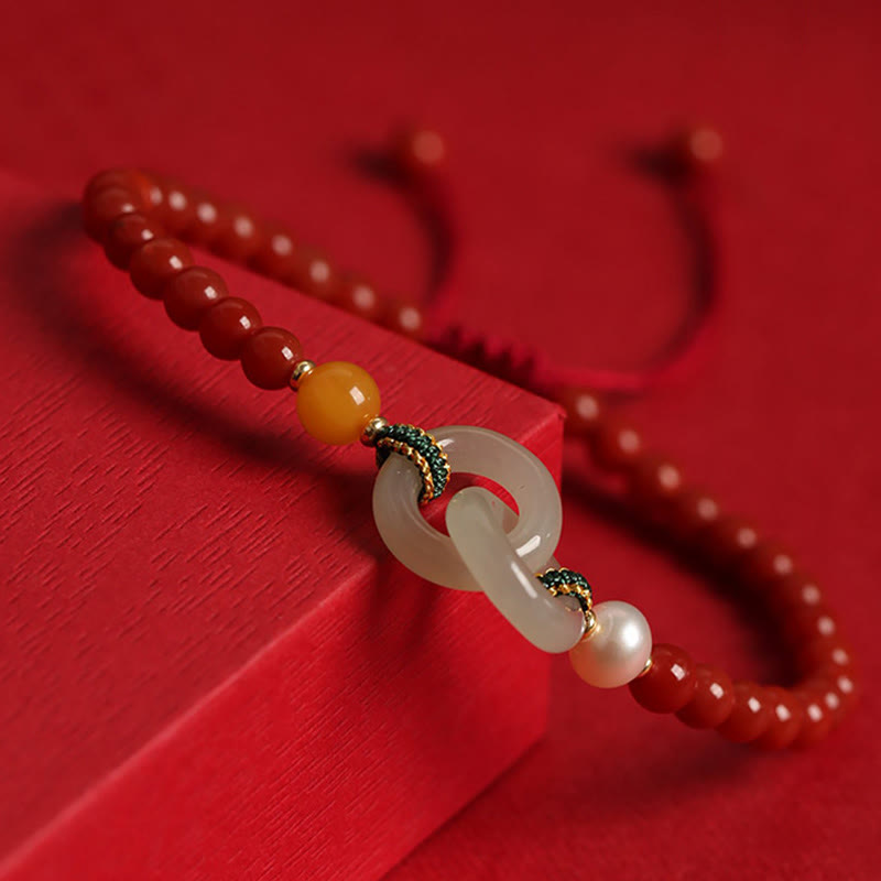 Armband Roter Achat Jade Frieden mit weißem Stein elegant getragen