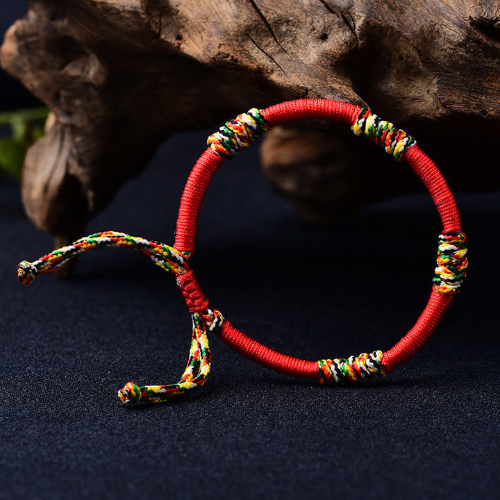 Rotes Armband – Schutz & Glück Balance mit bunten Akzenten