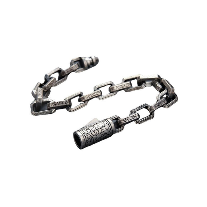 Silbernes Armband – Glück & Energie mit ornamentaler Kettengliederung und Zylinder.