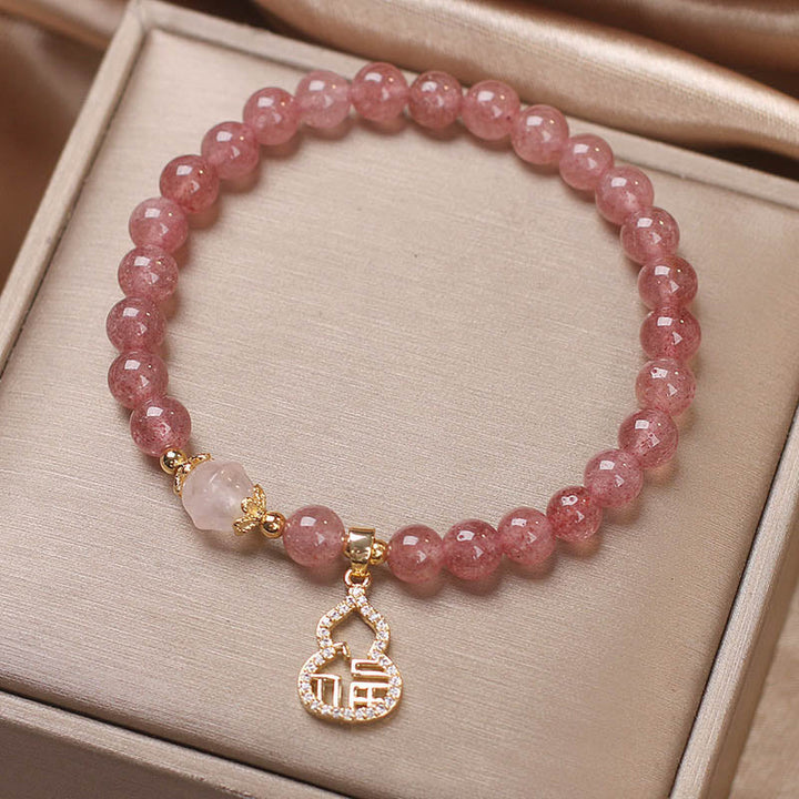 Armband Erdbeerquarz Fu-Zeichen Rosa Perlen Gold Anhänger elegant