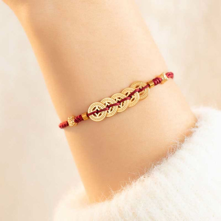 Armband Kupfer mit goldenen Münzen rotes elastisches Band Glück Stärke