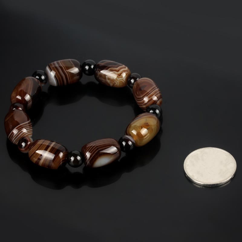 Armband Onyx – Glück & Mut mit braunen Achat Perlen und schwarzen Onyx Steinen