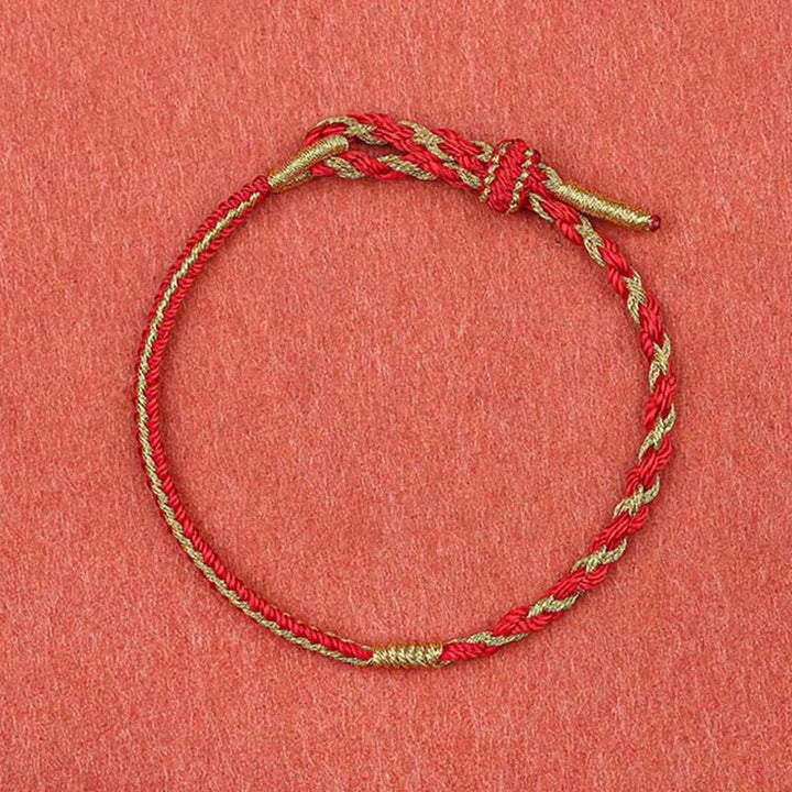 Rotes und goldenes geflochtenes Armband Chinesisches Tierkreis – Schutz Knoten