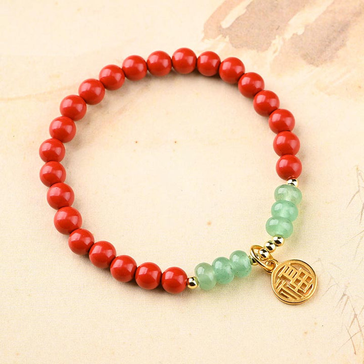 Armband Grüner Aventurin Zinnober rot grüne Perlen Goldanhänger elastisch