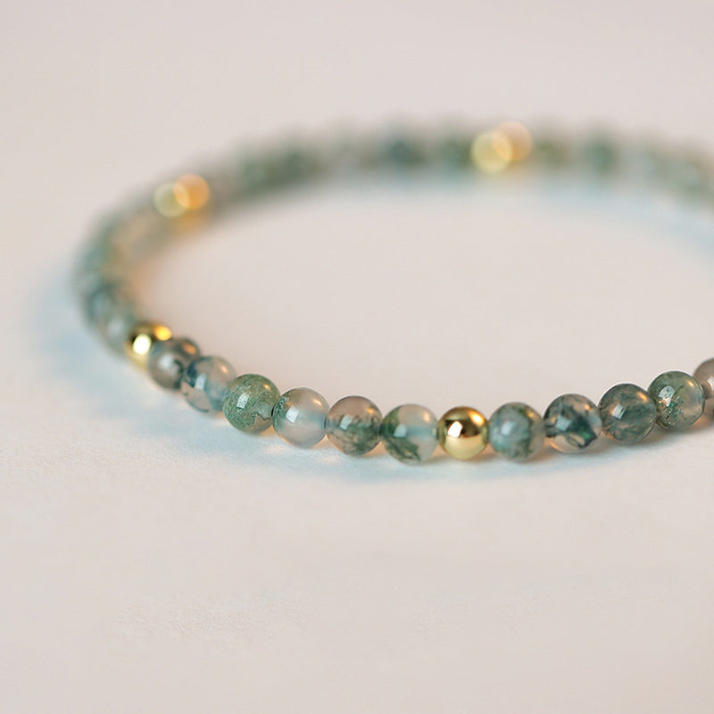Armband Achat – Glück & Balance grüne Natursteine goldene Perlen elastisch getragen
