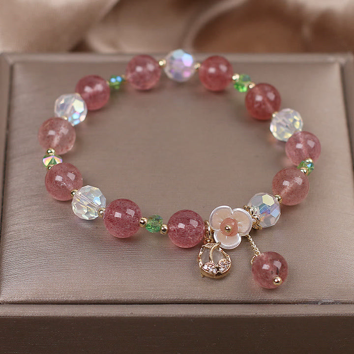 Armband Erdbeerquarz Fluorit Heilung rosa Perlen Blütenanhänger elegant
