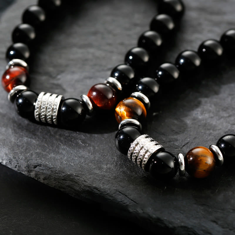 Armband Schwarzer Obsidian Tigerauge – Stärke mit silbernen Perlen elegant.