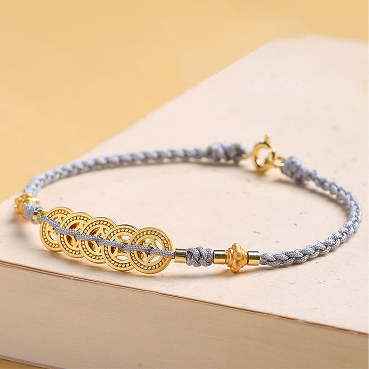 Armband Kupfer Perle Glück grau gold elegant Handgelenk getragen
