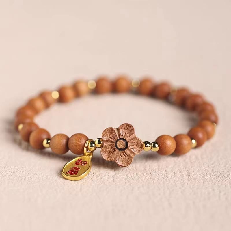 Armband Sandelholz Pfirsichblüte – Schutz elastisch Naturstein goldene Perlen