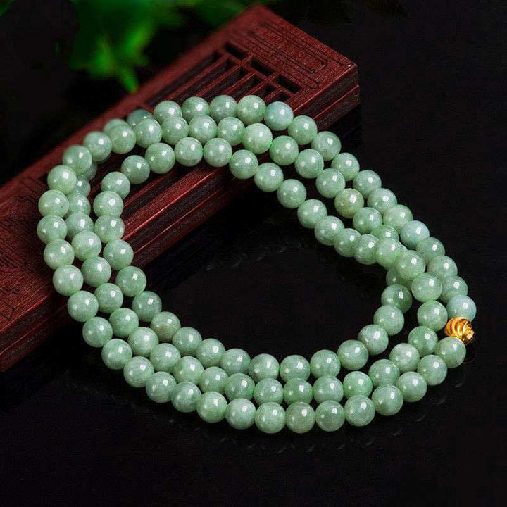 Mala 108 Perlen Jade – Glück grüne Perlen Holzständer elegantes Design
