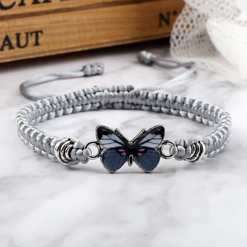 Armband Schmetterling – Liebe mit blauem Schmetterling Anhänger grau Makramee