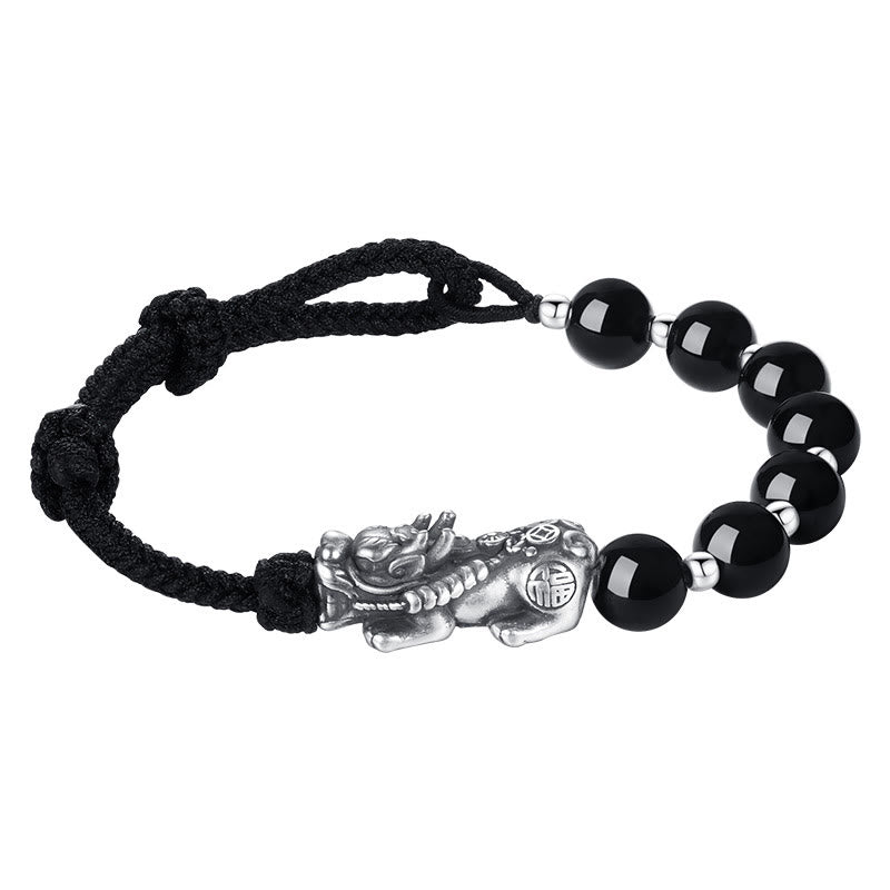 Schwarzes Obsidian Pixiu Armband mit Silber elastisch getragen Handgelenk