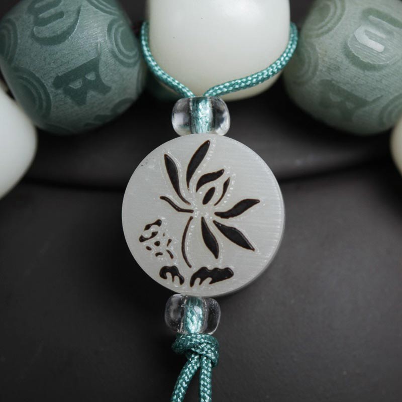 Weiße Jade Bodhi Om Mani Armband mit Türkis Kordel Detailaufnahme Schutz
