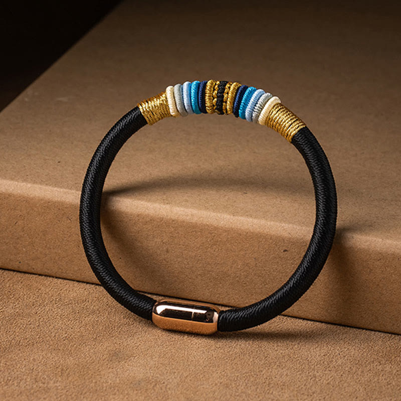 Schwarzes Armband mit goldenen und blauen Perlen Magnetisch Schutz Energie