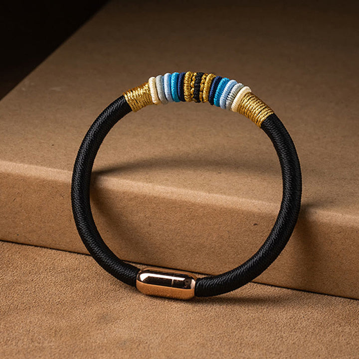 Schwarzes Armband mit goldenen und blauen Perlen Magnetisch Schutz Energie
