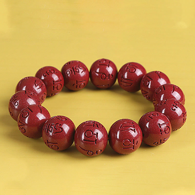 Rotes Zinnober Armband mit Om Mani Padme Hum Gravur elastisch